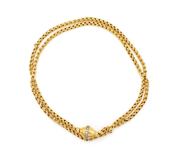 Lunga collana a laccio in oro e brillanti