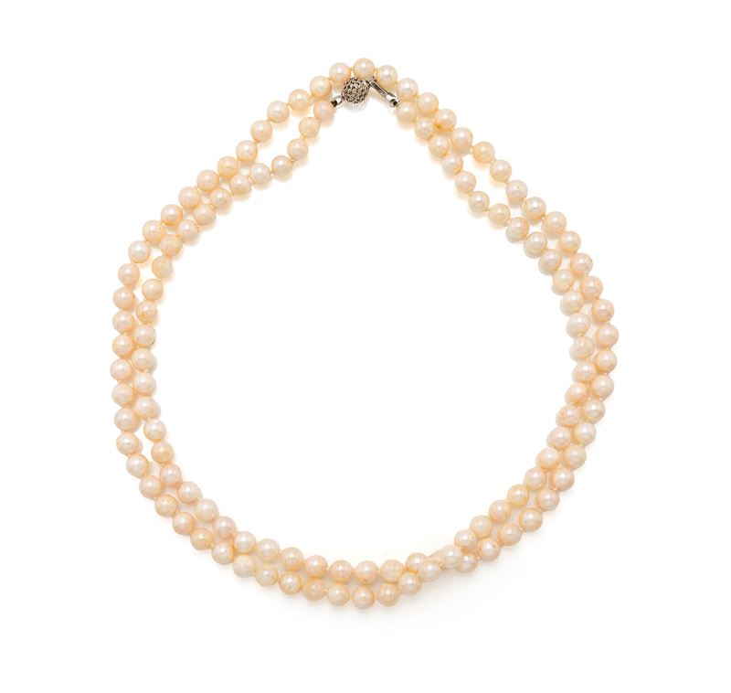 Collana ad un filo, perle e oro bianco 750/000