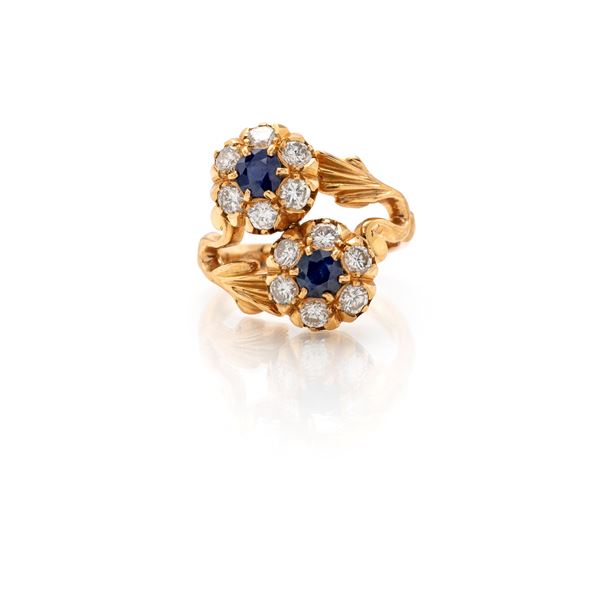 Anello contrariè in oro, diamanti e zaffiri