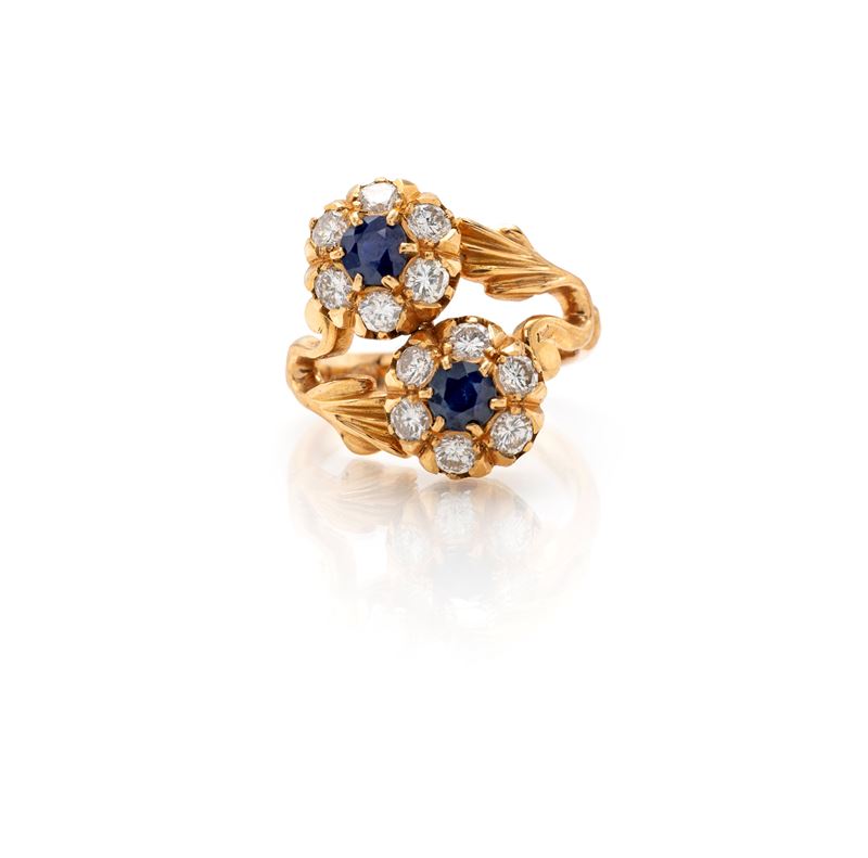 Anello in oro giallo 750/000 con diamanti e zaffiri