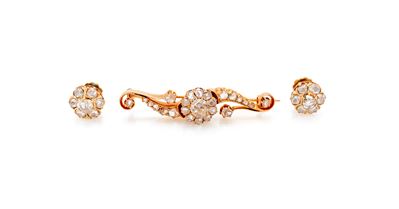 Parure in oro giallo 750/000, spilla e coppia di orecchini con diamanti