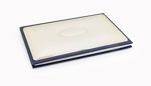 Rubrica telefonica con prima di copertina in lamina d'argento