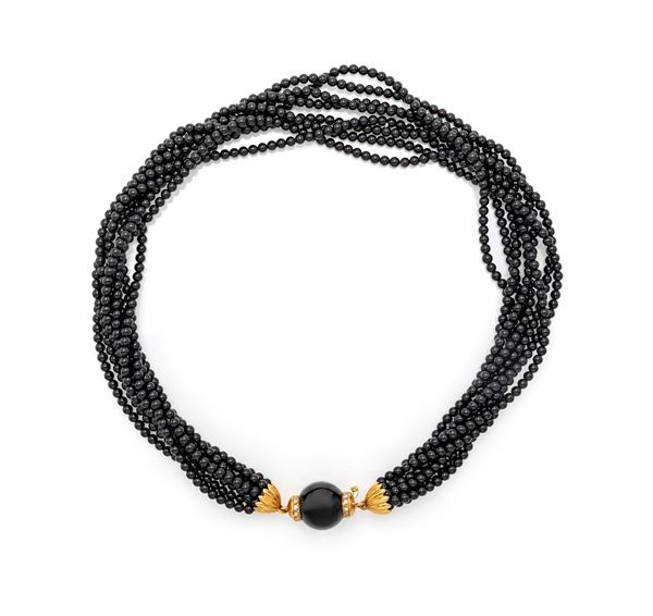Collana a torchon in onice, oro e brillanti