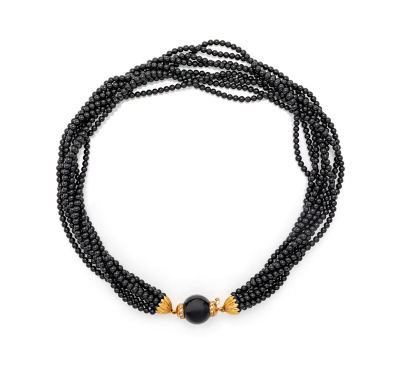 Collana a torchon in onice, oro giallo 750/000 e brillanti