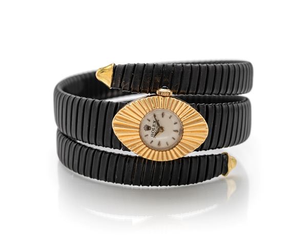 Rolex precision orologio in oro con bracciale personalizzato tubogas in acciaio brunito.