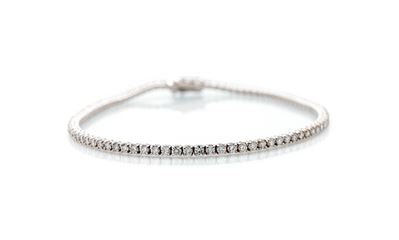 Bracciale tennis in oro bianco 750/000 con diamanti taglio rotondo brillante