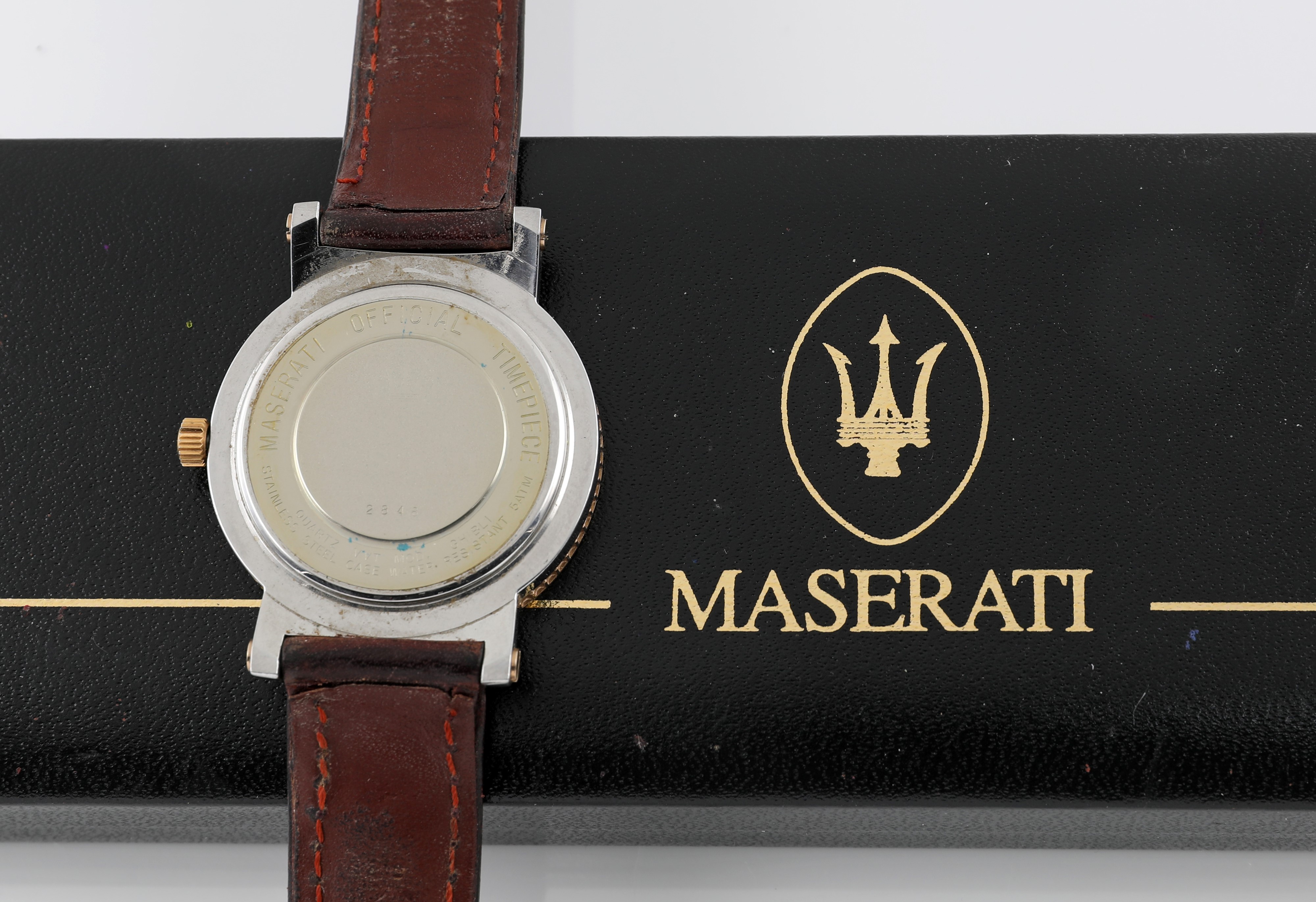 Maserati Ghibli, Orologio da polso al quarzo con datario e tachimetro, acciaio e placcatura in or...