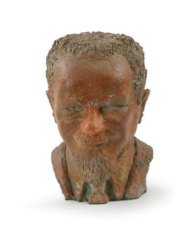 Ritratto di uomo con baffi e pizzetto in terracotta