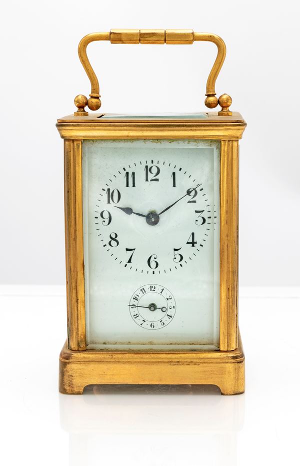 Cappuccina francese. Orologio sveglia a carica con chiavetta, scappamento a cilindro, con cassa in ottone