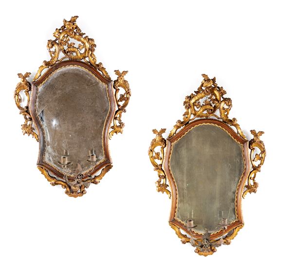 Coppia di specchiere in legno intagliato e dorato, Venezia, XVIII secolo