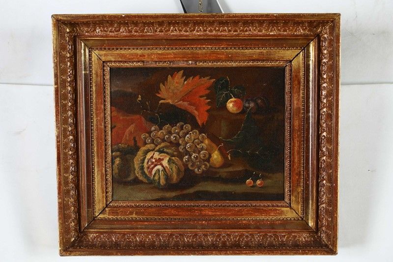 Scuola Romana del XVII Secolo - Natura Morta di Frutta Entro un Paesaggio