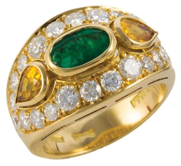Anello oro giallo gr.9,70,brillanti ct.1,58,zaffiri gialli ct. 1,20, smeraldo ct. 1,26