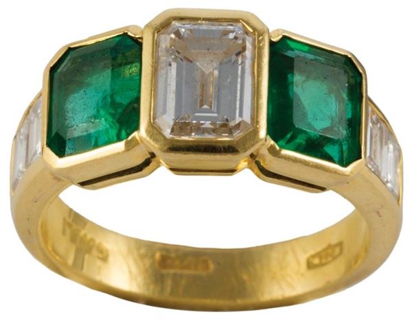 Anello brillante ct.1,04 I-Si2, e smeraldi ct.1,68, brillanti ct.0,64