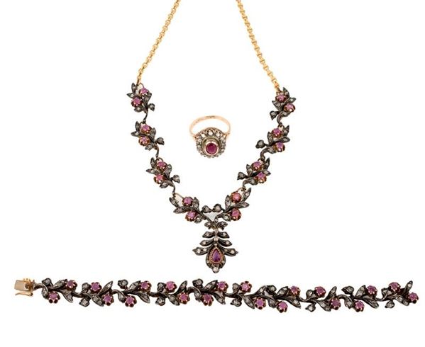 Parure in oro argento e pietre preziose