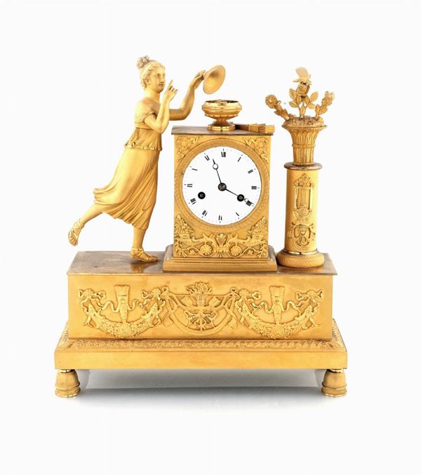 Orologio in bronzo dorato  - Asta Antiquariato Dipinti Antichi e del XIX secolo, Arredi, Tappeti, e Argenti - Casa d'Aste Arcadia