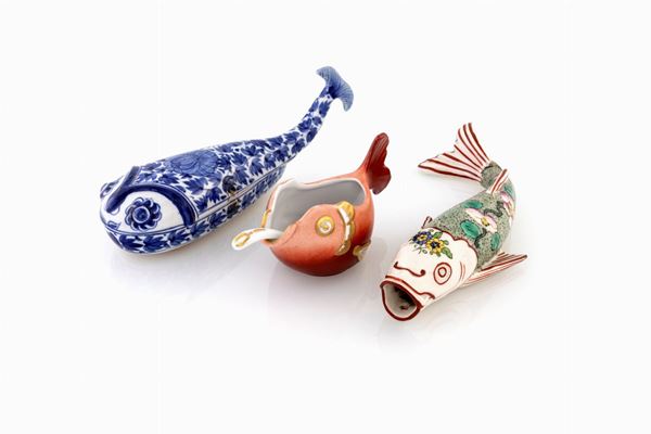 Lotto composto da tre figure di pesce in porcellana