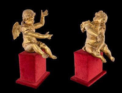 Coppia di Sculture in Legno Dorato