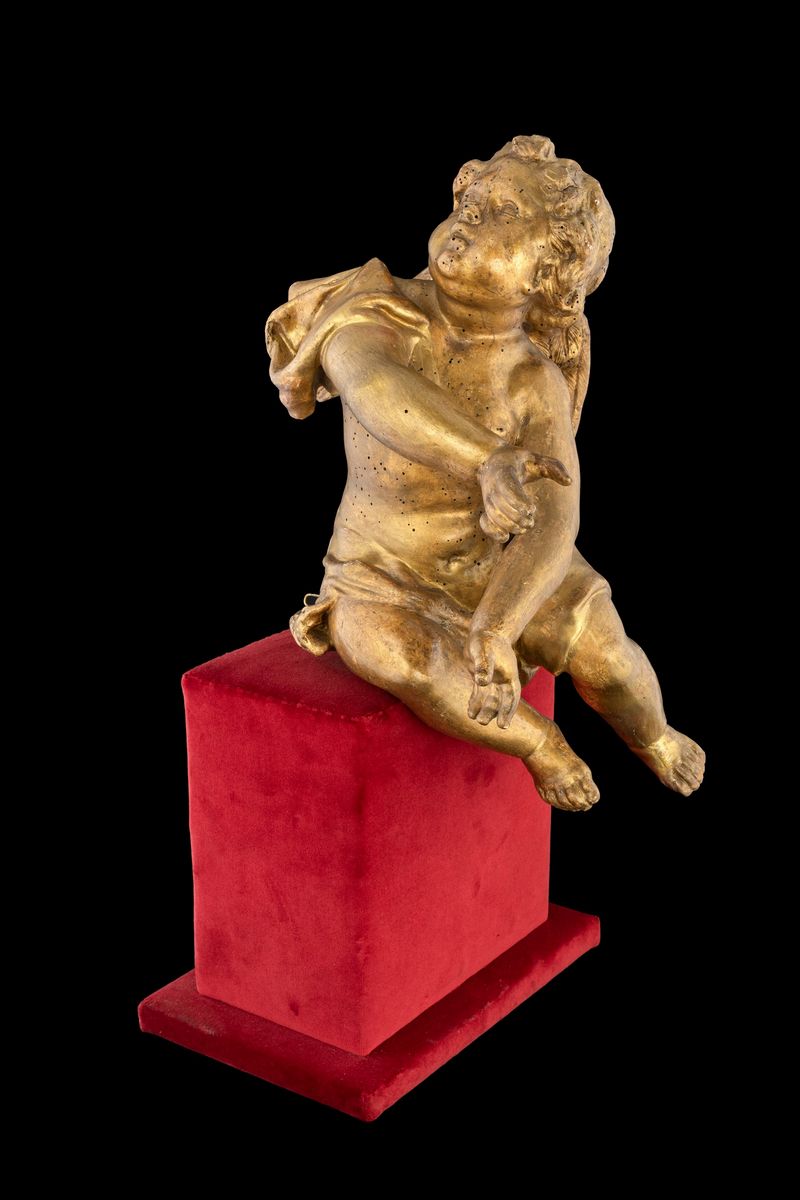 Coppia di Sculture in Legno Dorato