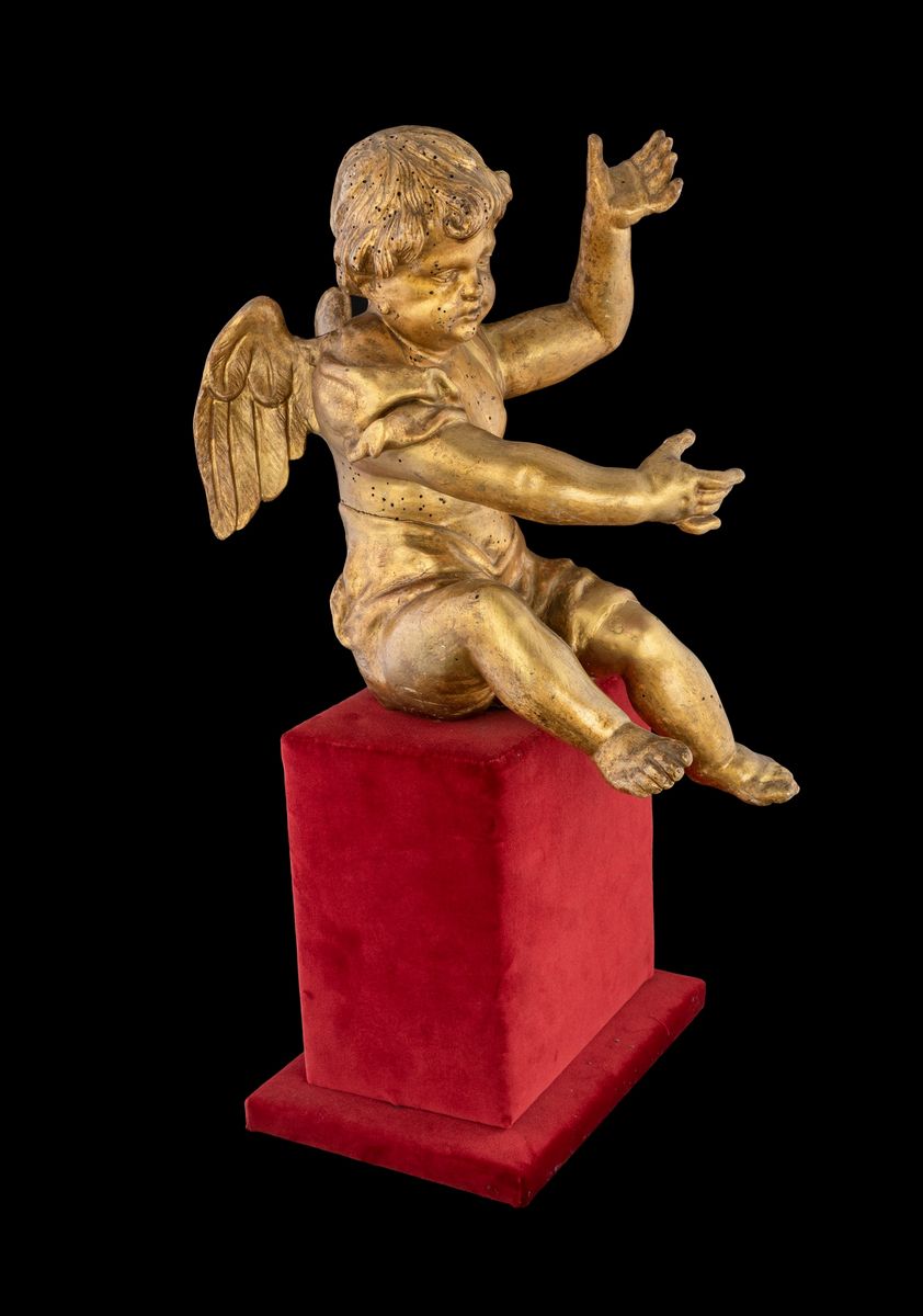 Coppia di Sculture in Legno Dorato