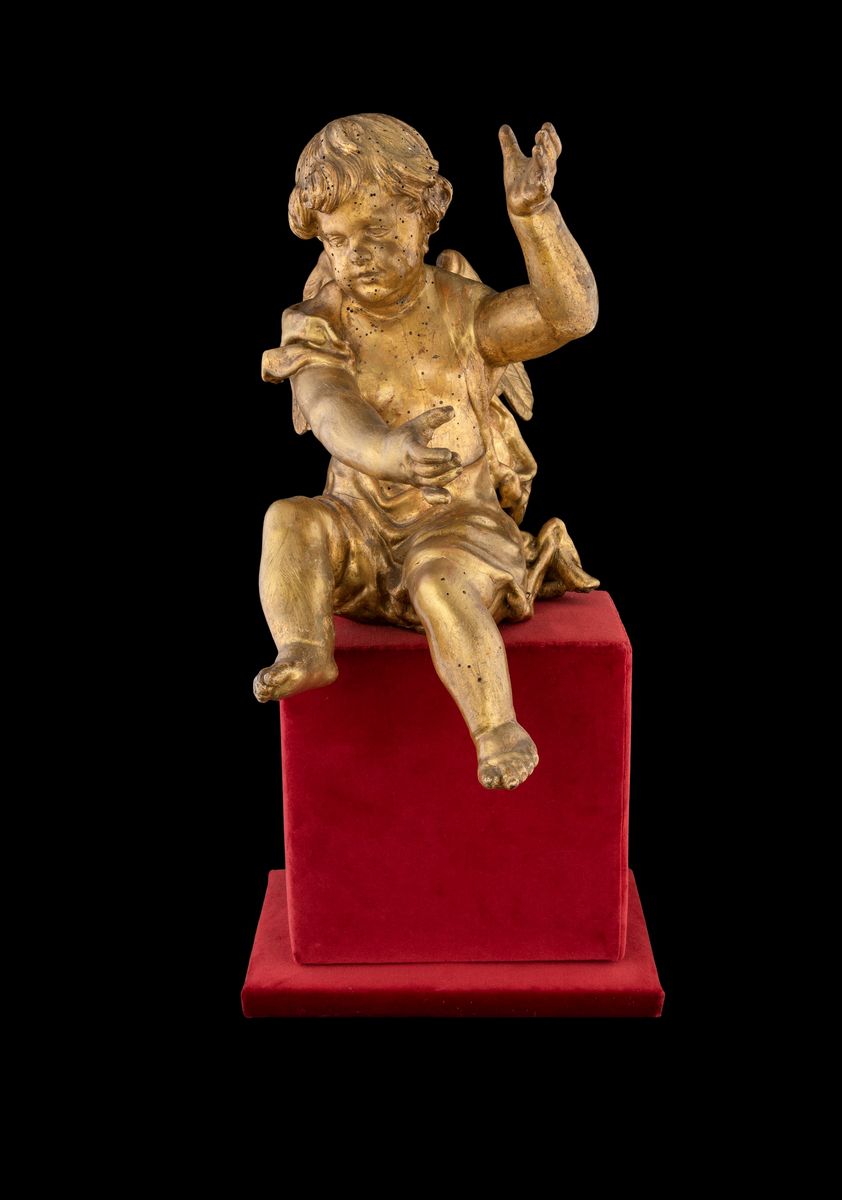 Coppia di Sculture in Legno Dorato