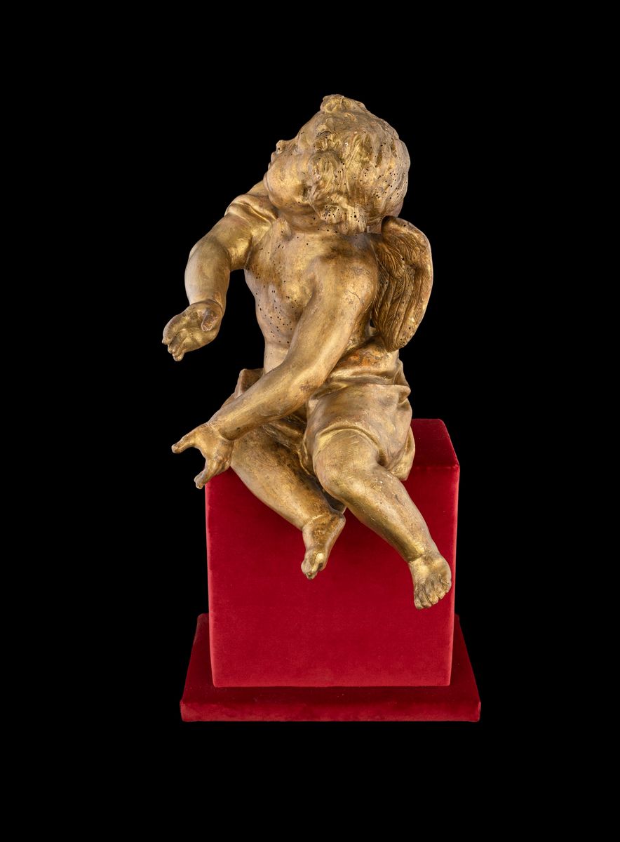Coppia di Sculture in Legno Dorato
