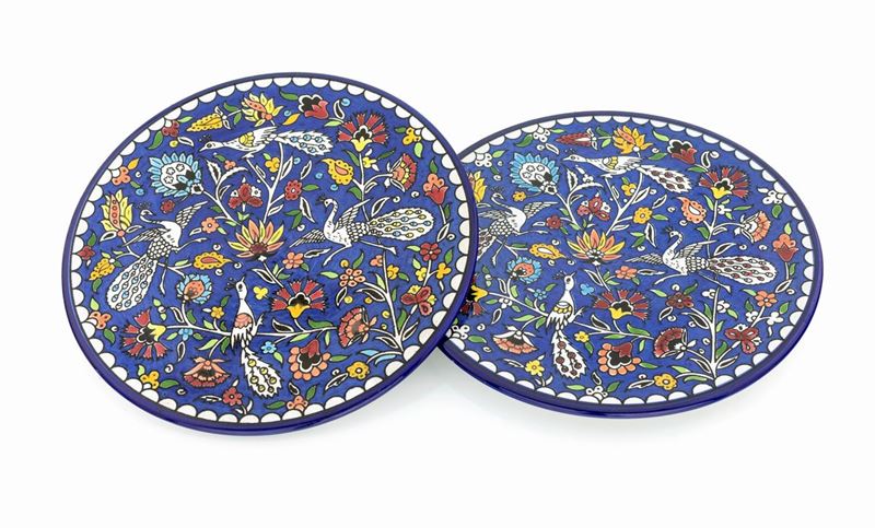 Due Piatti in Maiolica Policroma