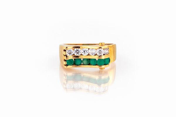 ANELLO A FASCIA CON PIETRE VERDI E ZIRCONI